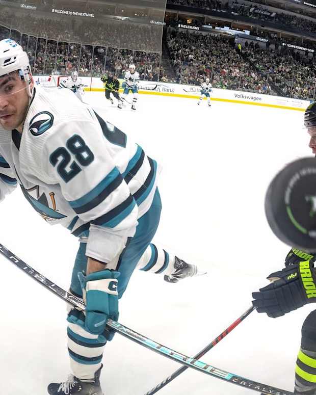 Nov 11, 2022; Dallas, Texas, USA; San Jose Sharks right wing Timo Meier (28) and Dallas Stars defenseman Ryan Suter (20) look for the puck in the air during the second period at American Airlines Center. Mandatory Credit: Jerome Miron-USA TODAY Sports